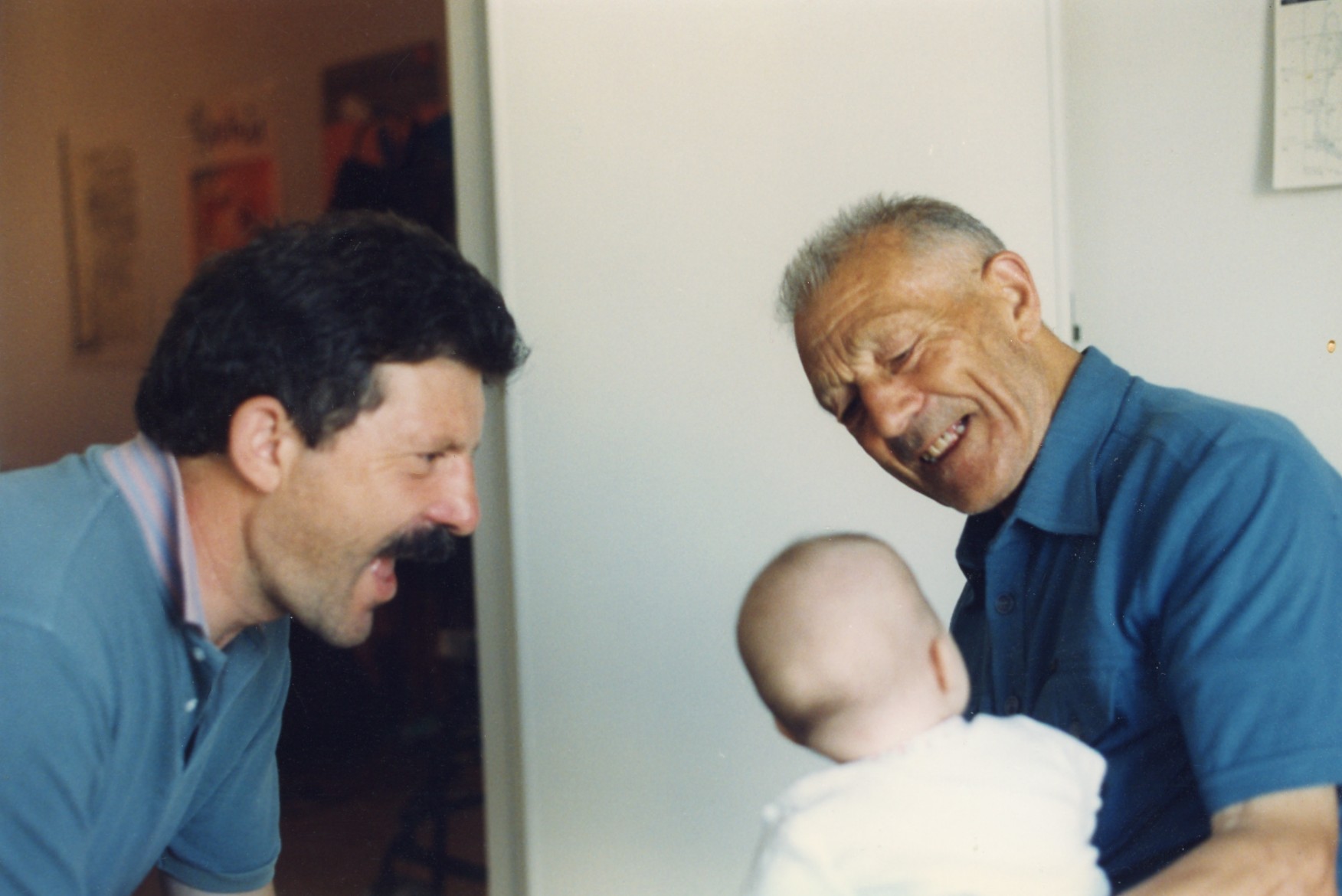 Francesco and his father playing with Sarah in 1994