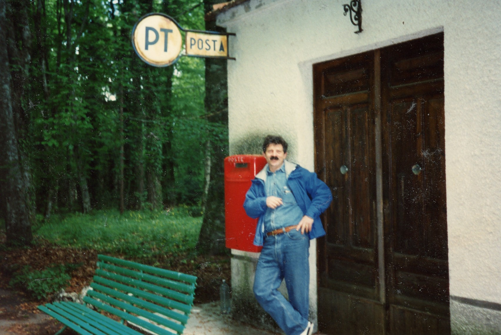 Francesco posing in front of his post office in the Foresta Umbra