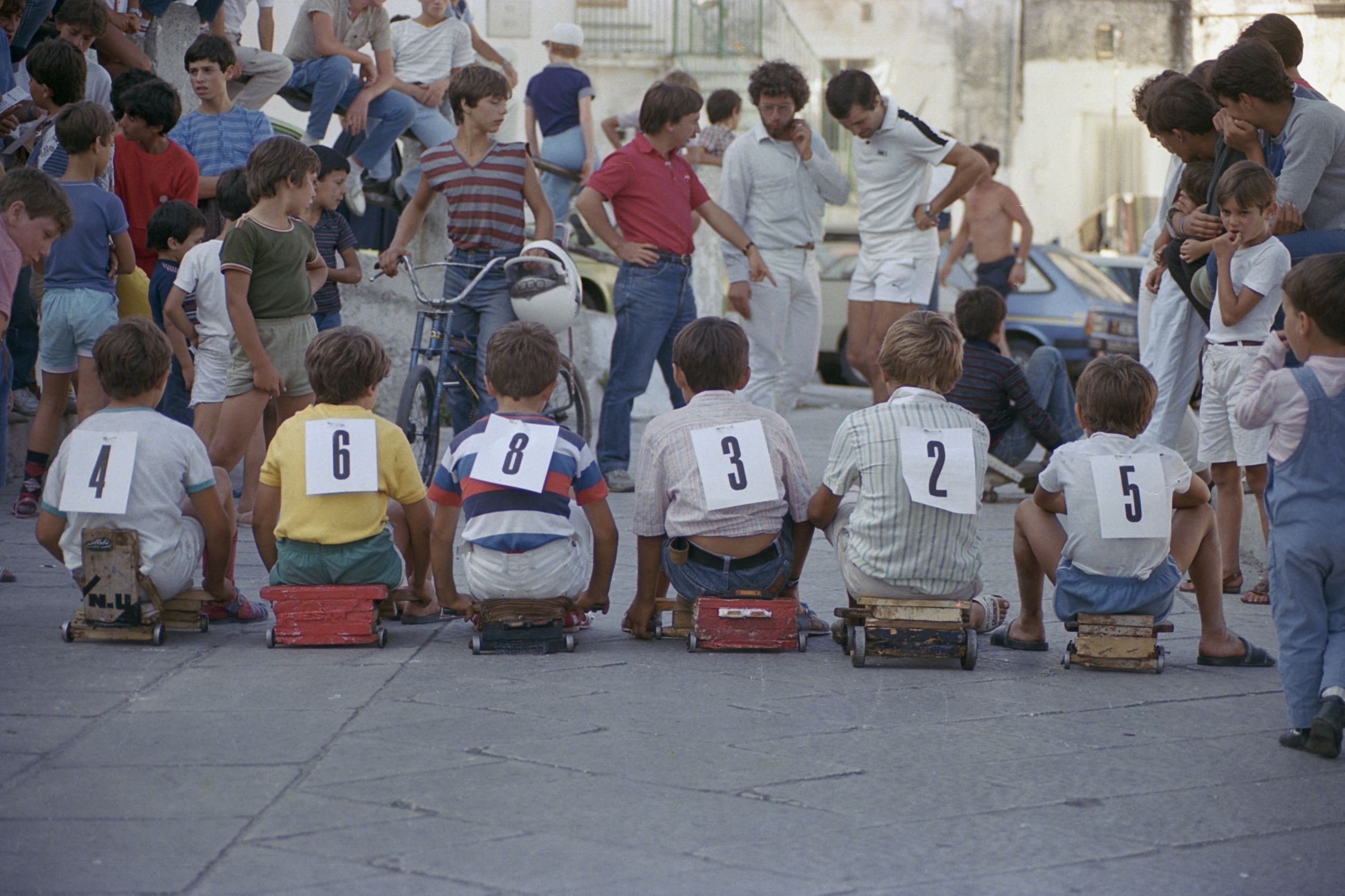 Children about to race on sleds