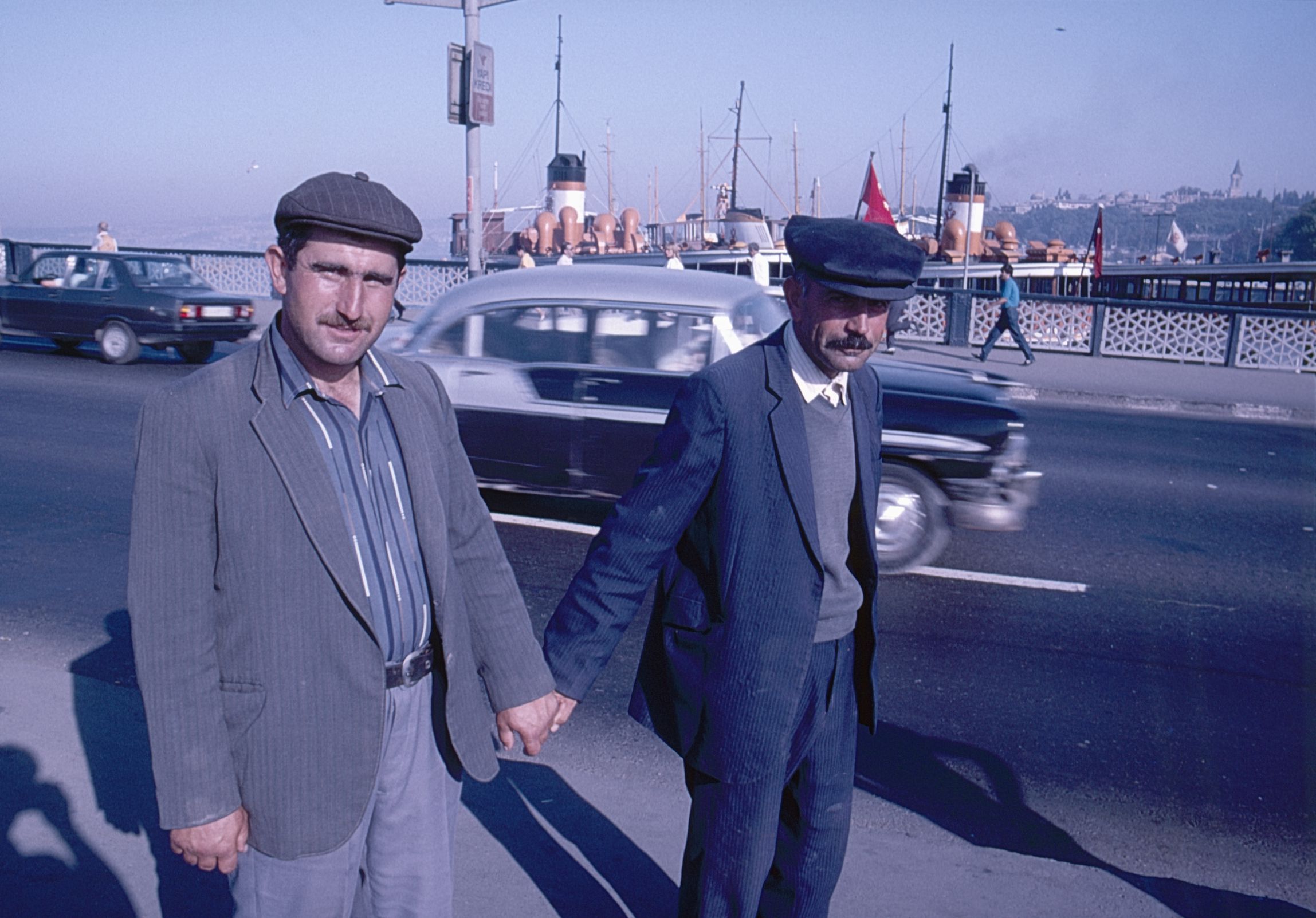 Two men holding hands in Istanbul in 1986